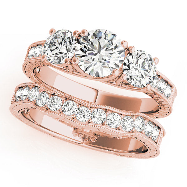 ENGAGEMENT RINGS 3 STONE ROUND